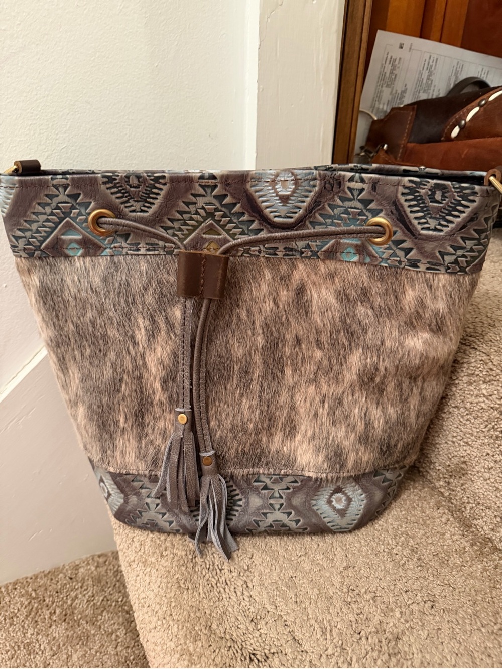 Wild goose cinched bucket bag